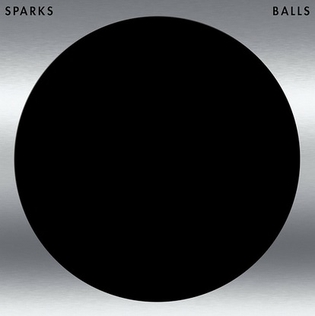 The sleeve illustration for Balls by Sparks. A black circle on a silver background. The black is as black as a small moustache.