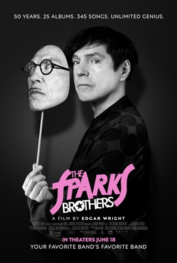 The promotional poster for 'The Sparks Brothers'. A man who once had curly hair standing in half profile. He is holding a mask on a stick of the face of a man with a small moustache. The poster says '50 years, 25 albums, 345 songs, unlimited genius' and 'Your favourite band's favourite band'.